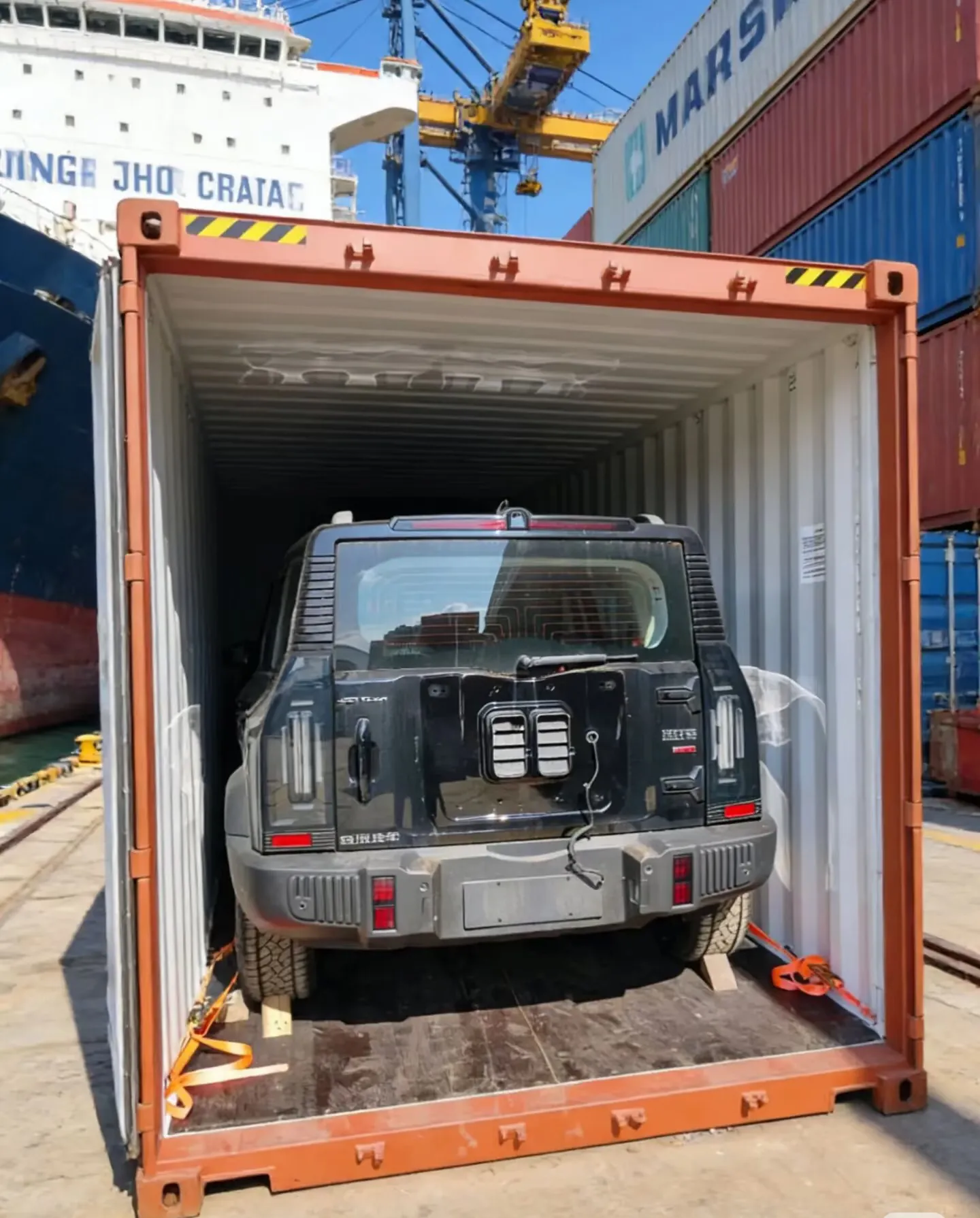 SUV secured in a container for sea freight
